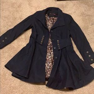 Updated pea coat with pleats and corset like style
